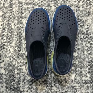 Native boys slip on